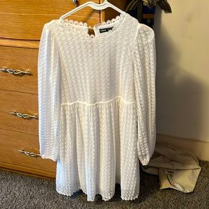 Women’s lacy long sleeve dress.